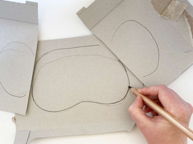 Cardboard with the shape of a koala mask outline. Cardboard with the shape of a koala mask outline.