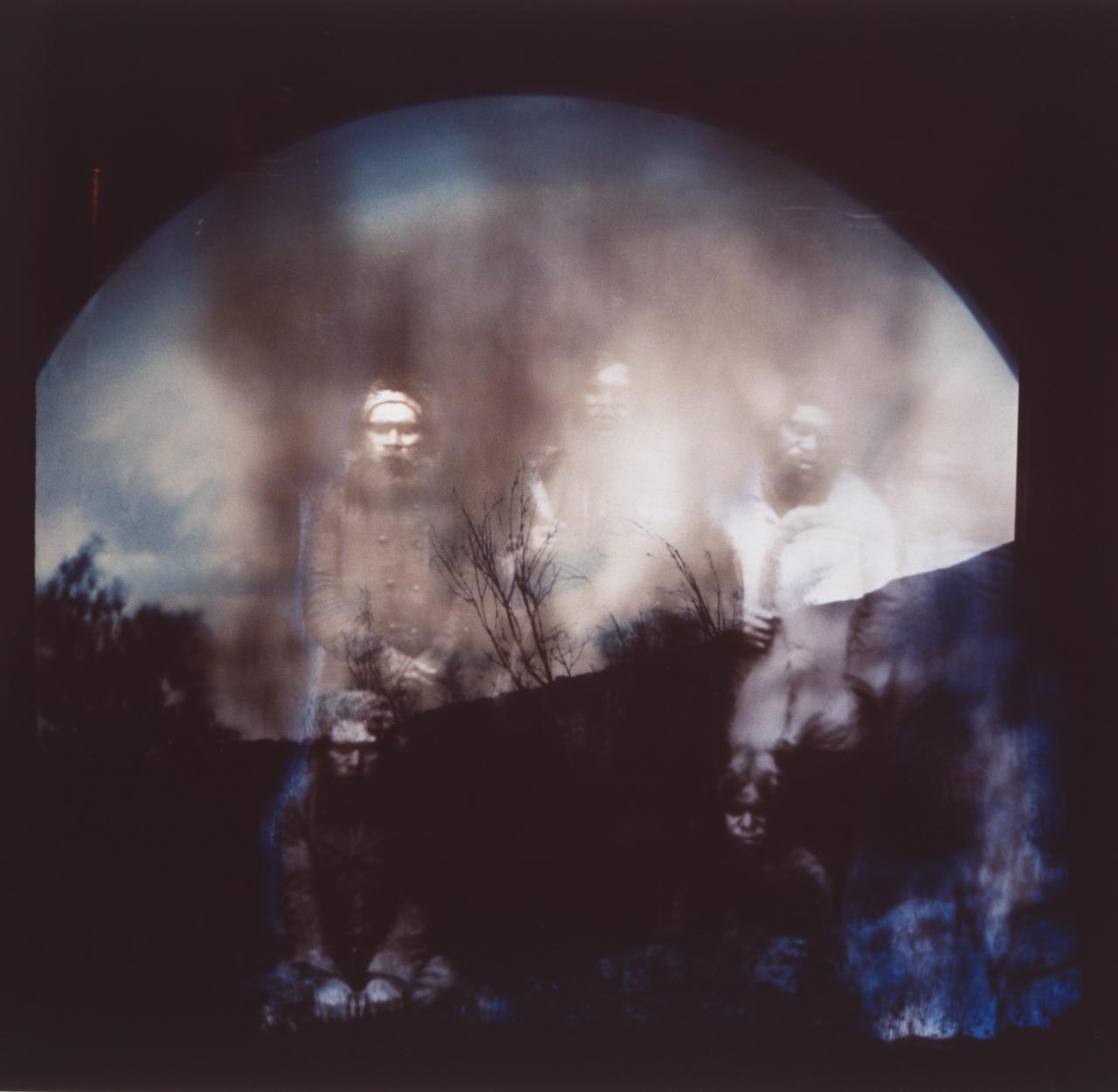 Artwork superimposing faded photography of Indigenous Australian people over a silhouetted landscape. Artwork superimposing faded photography of Indigenous Australian people over a silhouetted landscape.