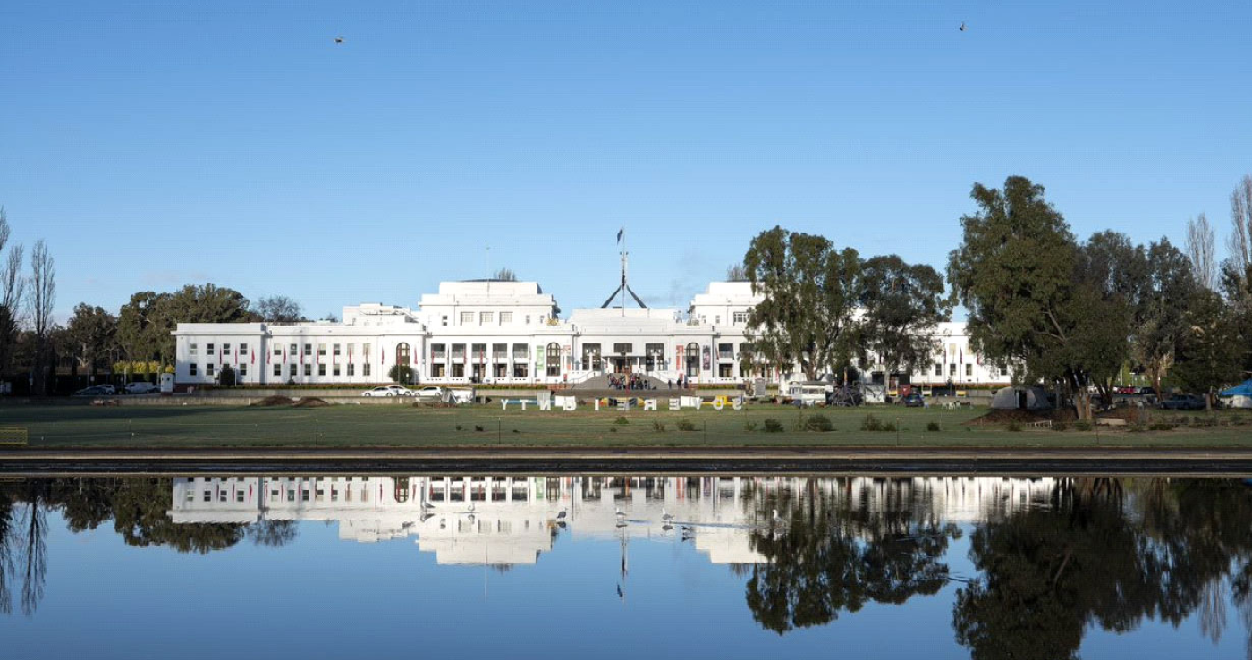 A view of Old Parliament House across the water, complete with reflection A view of Old Parliament House across the water, complete with reflection