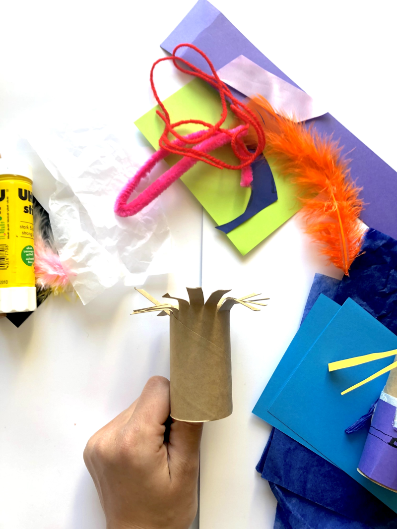 A toilet roll with the top cut into strips to represent hair. A toilet roll with the top cut into strips to represent hair.