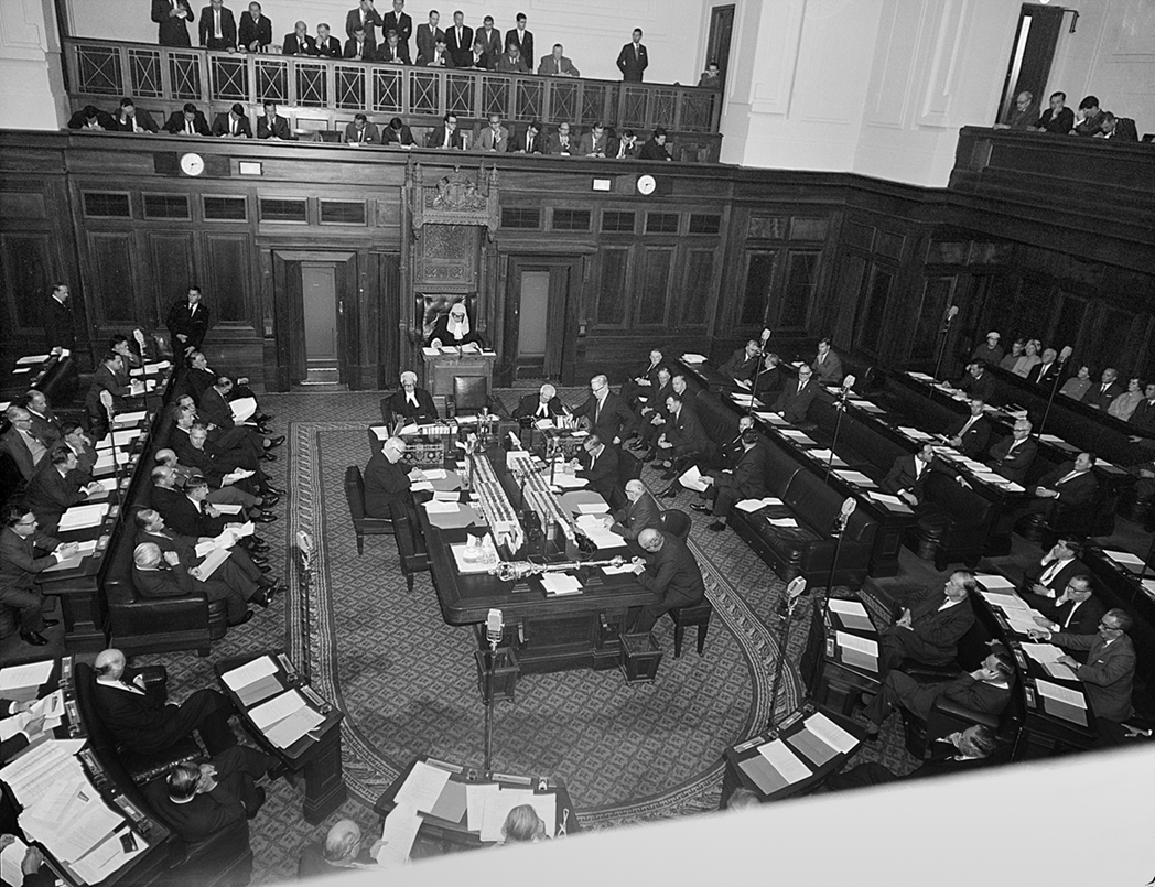 House of Representatives Chamber. A man is speaking at the opposition despatch box. House of Representatives Chamber. A man is speaking at the opposition despatch box.