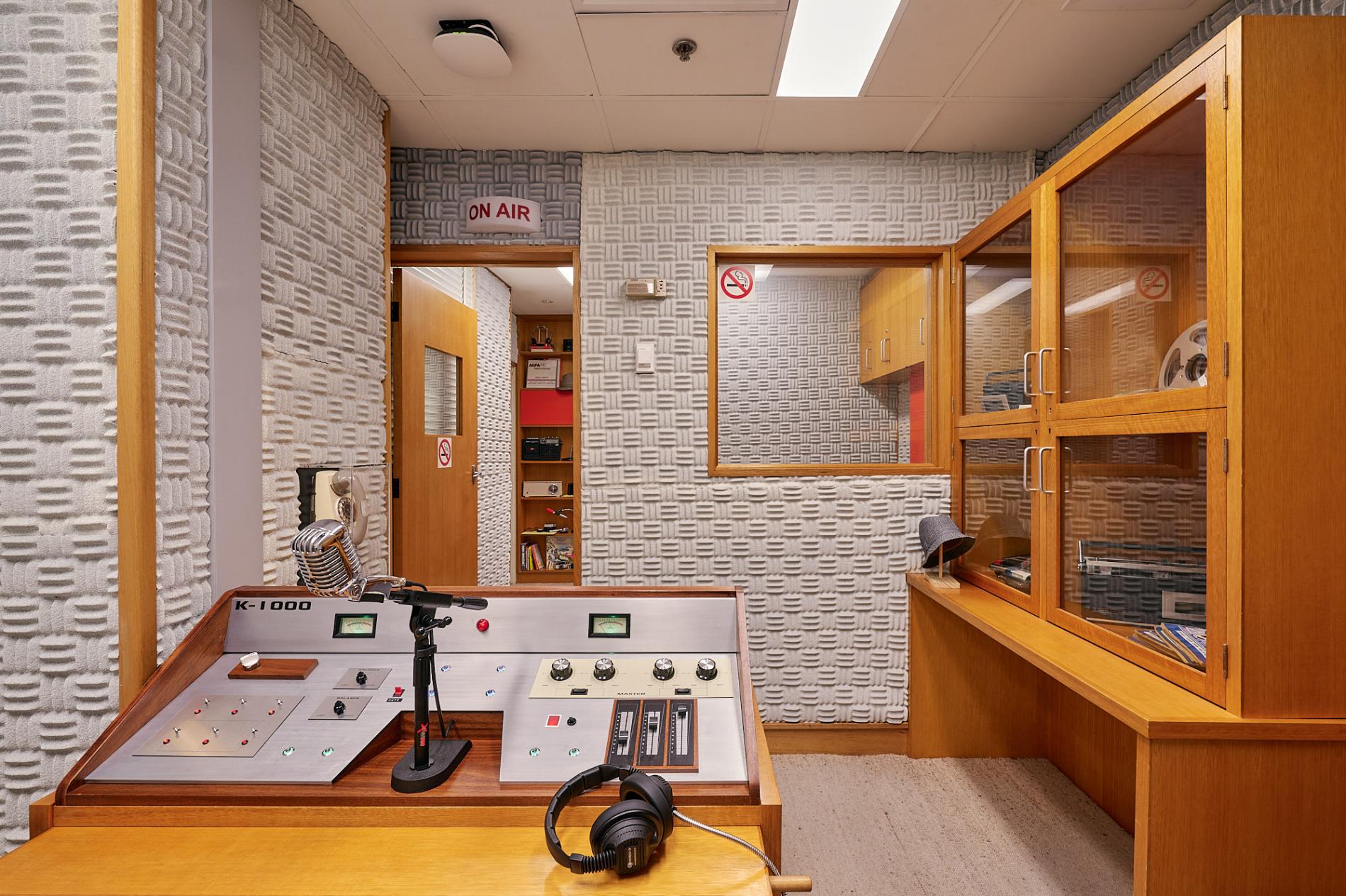 A radio console with microphone set up in the Press Gallery exhibition in Old Parliament House.