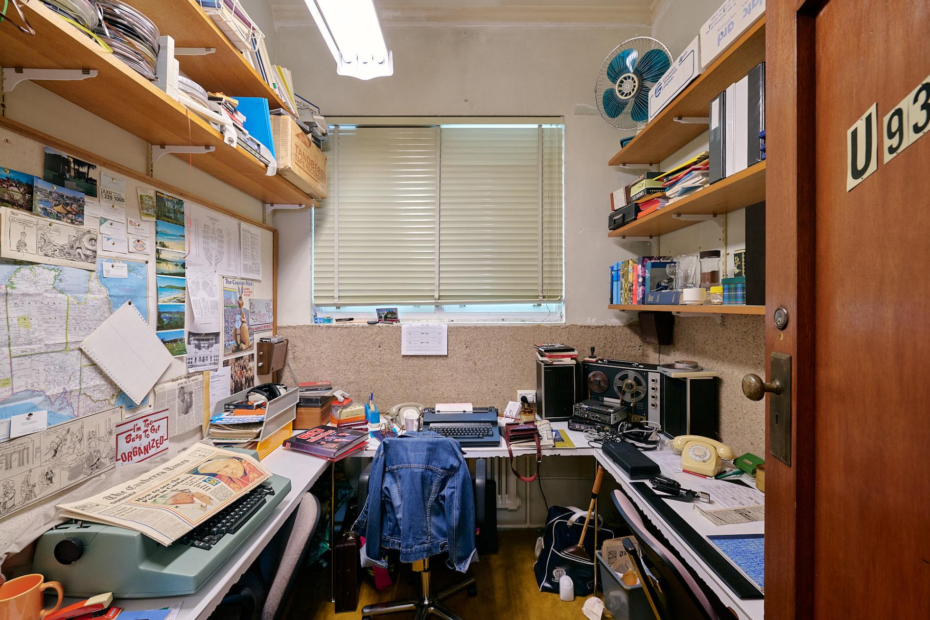 A room recreated to look like a messy press office in the 1980s in the Press Gallery exhibition in Old Parliament House.