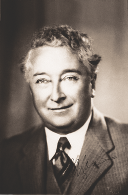 A scan of a black and white portrait image showing former prime minister Joseph Lyons.