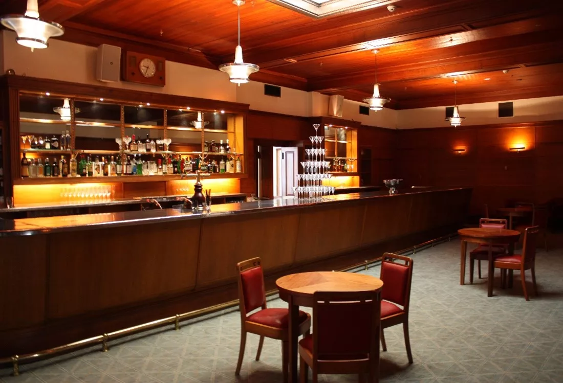 A wood panelled bar. A wood panelled bar.
