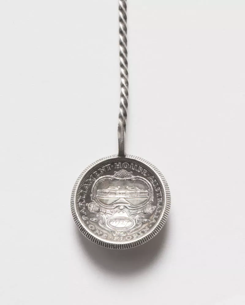 Photograph of a decorative souvenir spoon. Photograph of a decorative souvenir spoon.