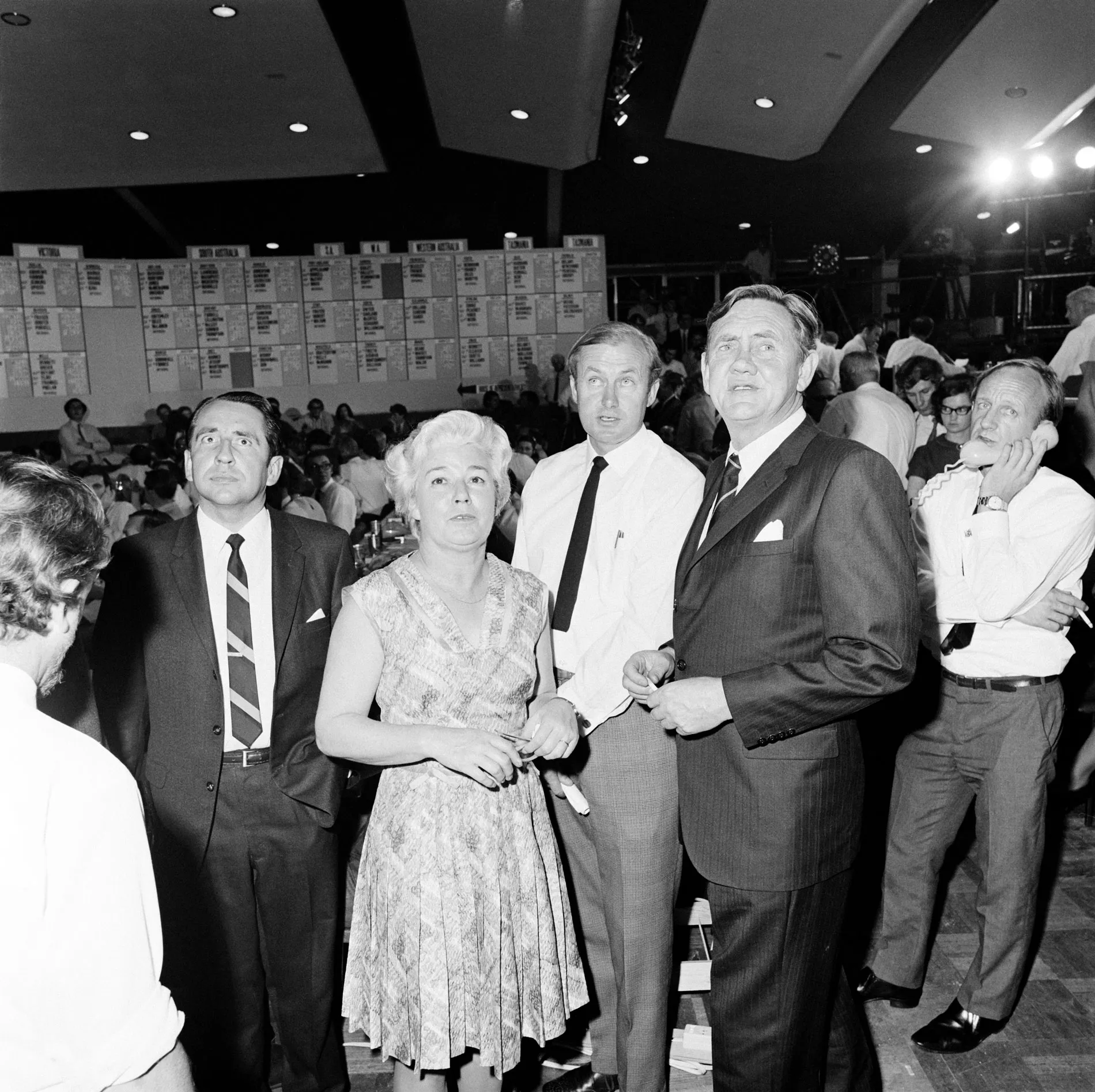 John Gorton and a crowd stand in the National Tally Room during the 1969 federal election. John Gorton and a crowd stand in the National Tally Room during the 1969 federal election.