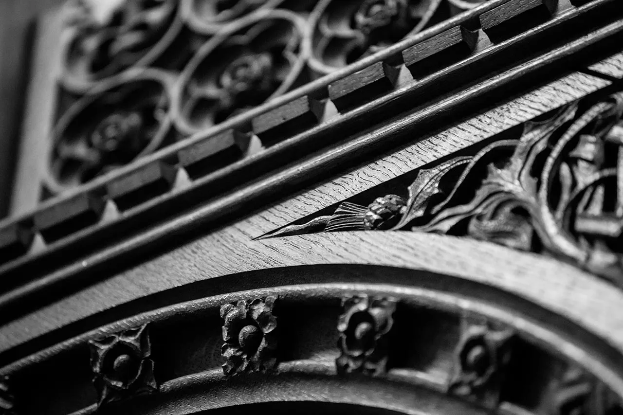 Decorative wood detailing on a panel in Old Parliament House.