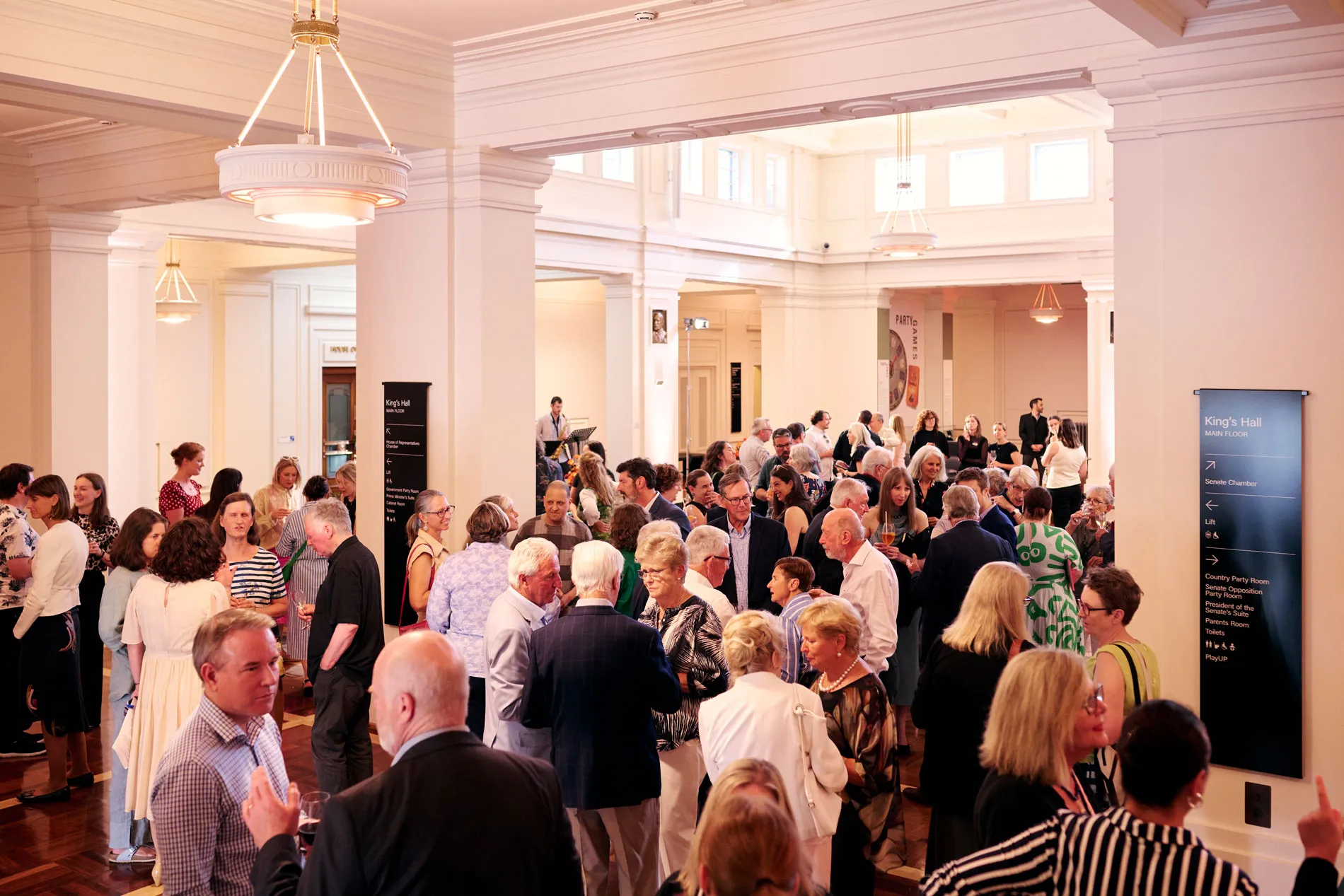Partners of the Museum of Australian Democracy gathered in King's Hall for the launch of a Behind the Lines exhibition.