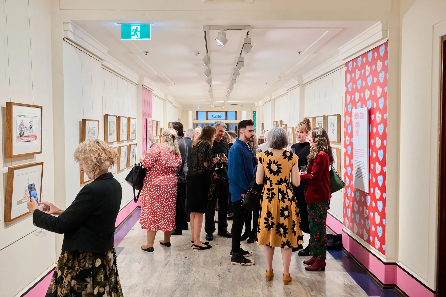 An image of partners of the Museum of Australian Democracy at the Behind the Lines cartooning exhibition 2024.