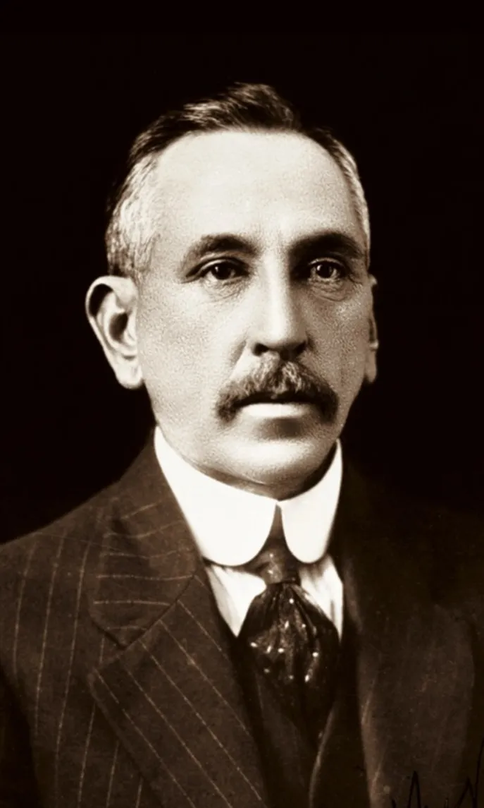 Portrait photograph of Billy Hughes, wearing a pin-striped suit. Portrait photograph of Billy Hughes, wearing a pin-striped suit.