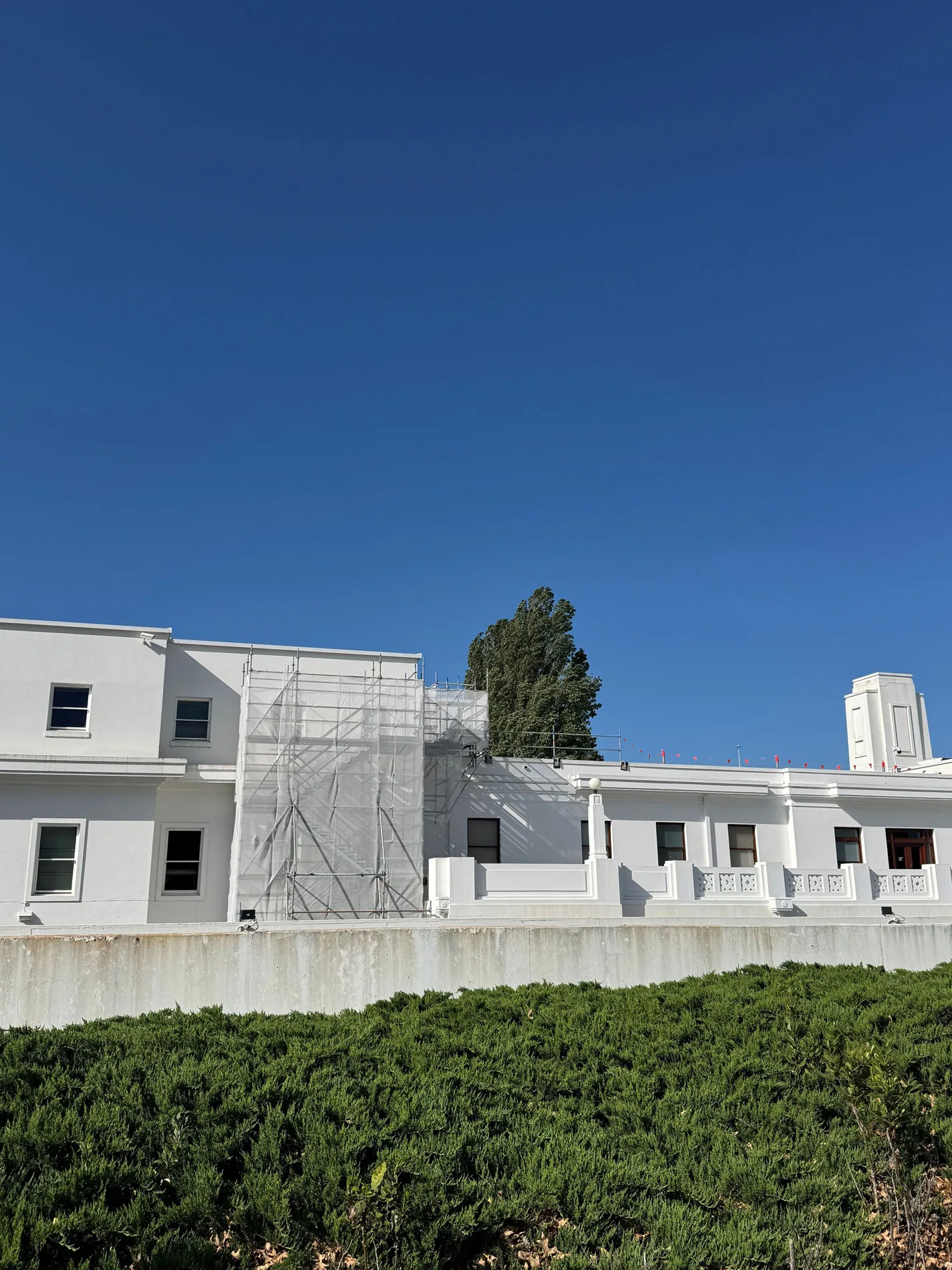 Back of Old Parliament House in Canberra with scaffolding.