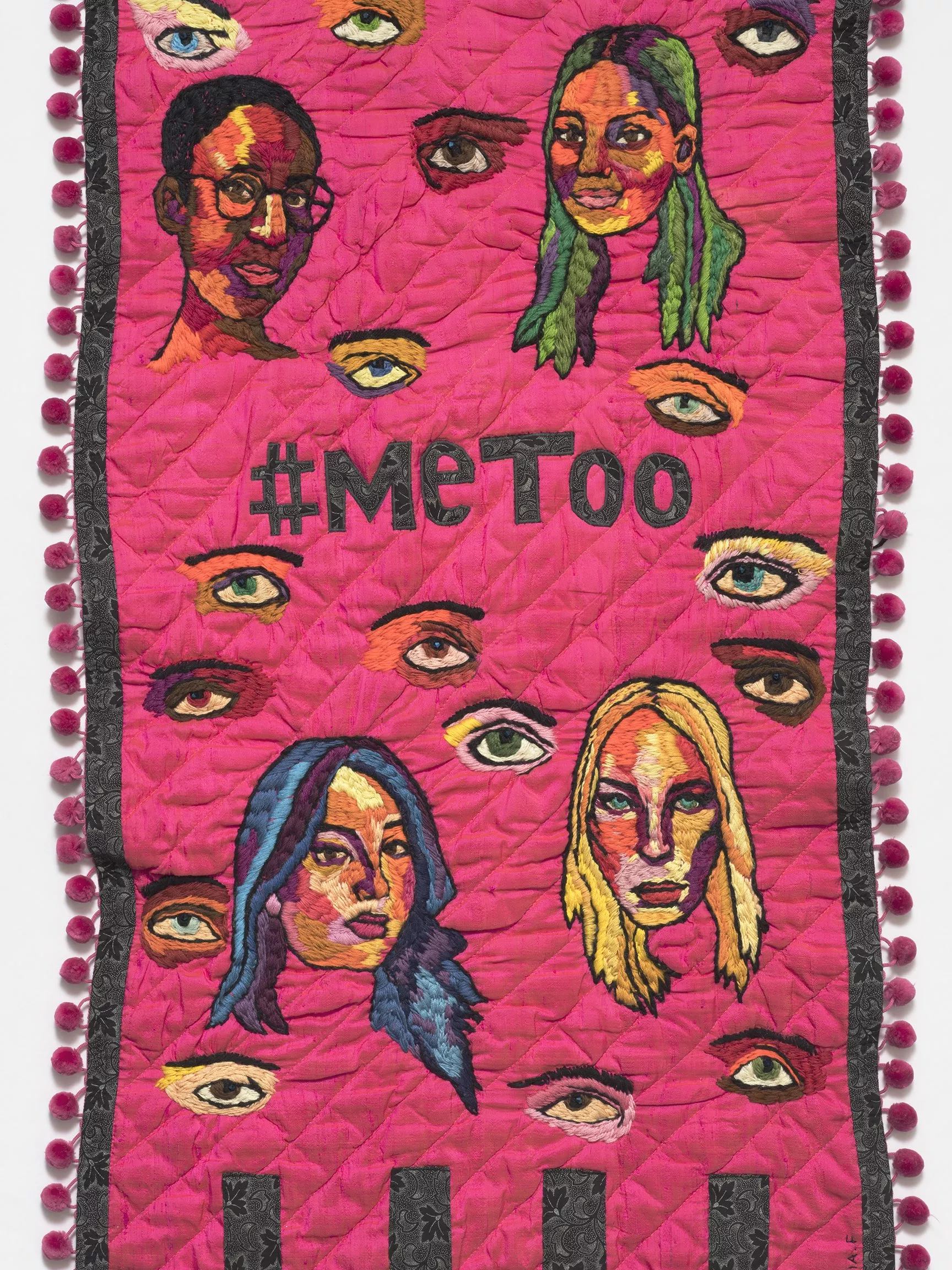 #metoo by Sofia Fitzpatrick and Tal Fitzpatrick. A pink embroidered banner with the words #metoo in the centre and images of women's face surrounding it.