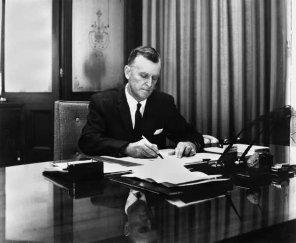 Photograph of Joh Bjelke-Petersen.
State Library of Queensland. Photograph of Joh Bjelke-Petersen sitting at a desk writing