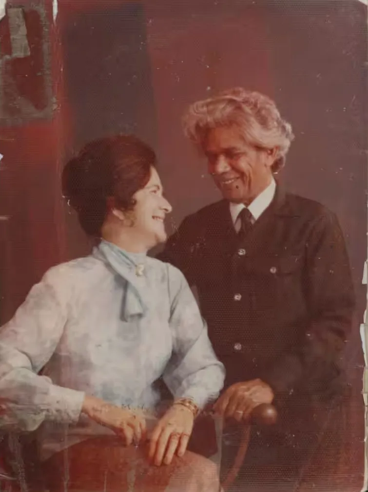 A photo of Neville and Heather Bonner that he kept in his wallet. Museum of Australian Democracy Collection. Worn and faded photograph of Heather and Neville Bonner, sitting together and smiling at each other.