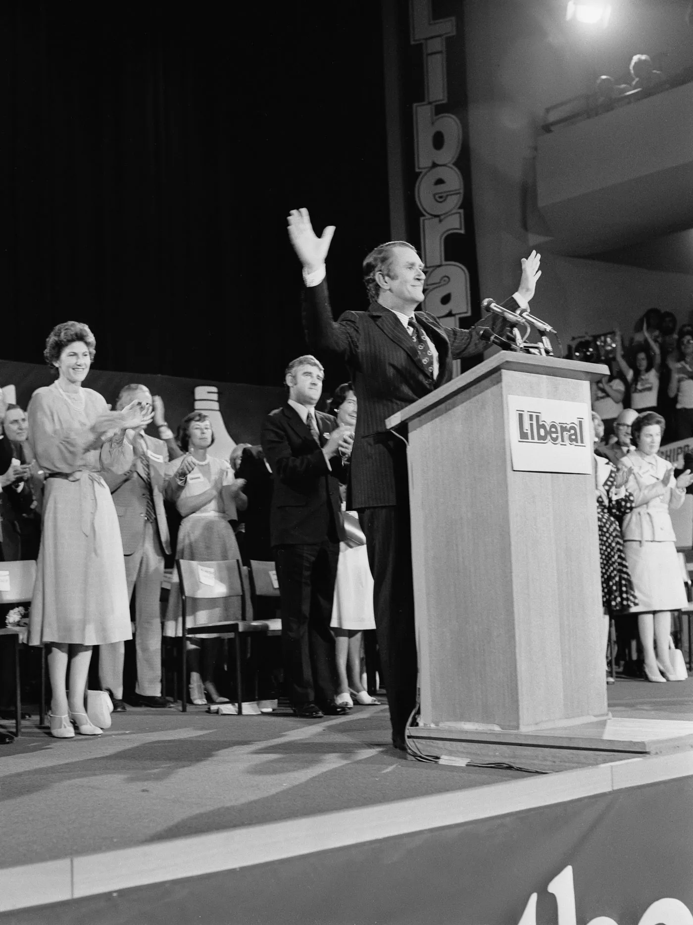 Malcolm Fraser at the launch of the Liberal Party's election campaign at Dallas Brooks Hall, 1975.
Photograph NAA: A6180, 1/12/75/13 Malcolm Fraser stands at a podium on stage at a Liberal campaign rally.