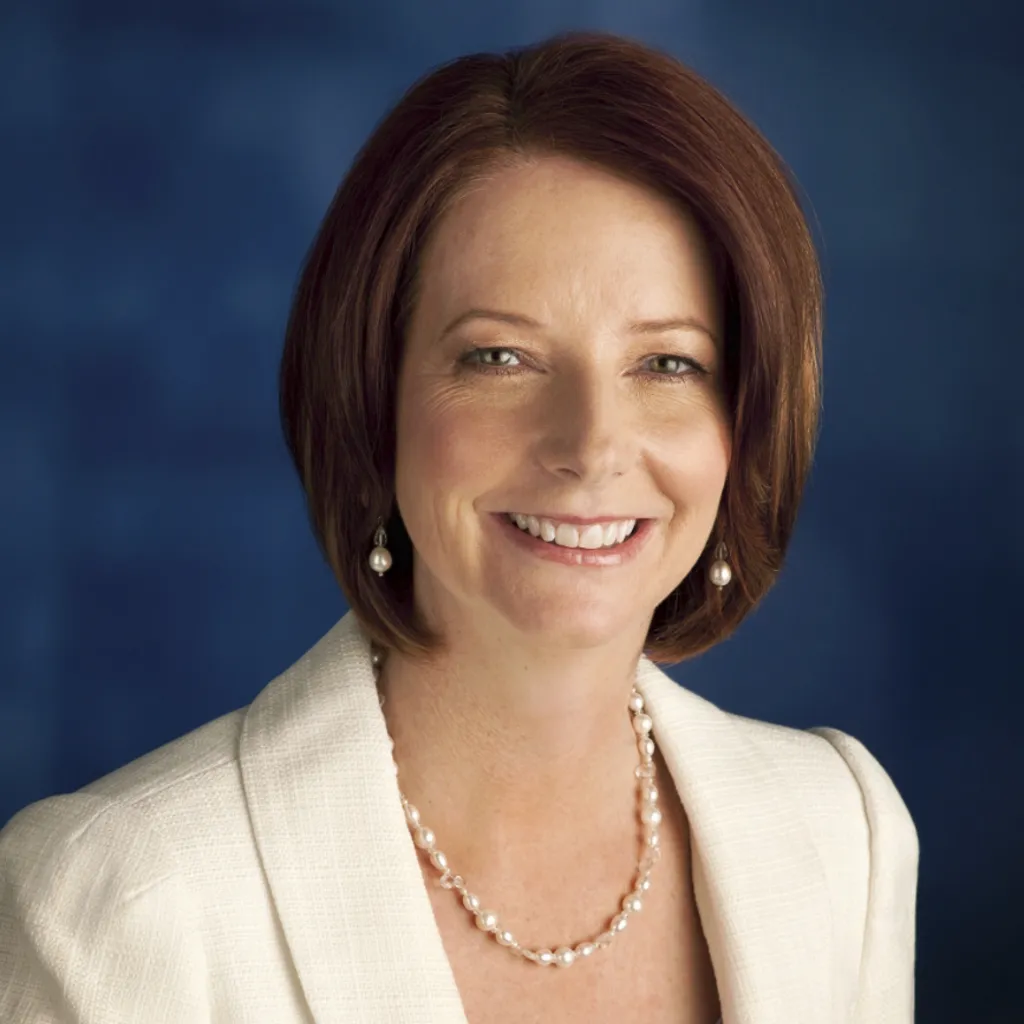 Julia Gillard. Julia Gillard wearing a pearl necklace and earrings and a white jacket.
