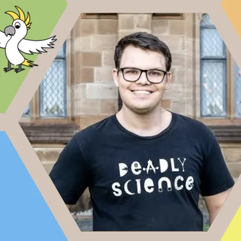 Colourful hexagons surrounding a man smiling and wearing a black t-shirt with the words 'Deadly Science'. Colourful hexagons surrounding a man smiling and wearing a black t-shirt with the words 'Deadly Science'.