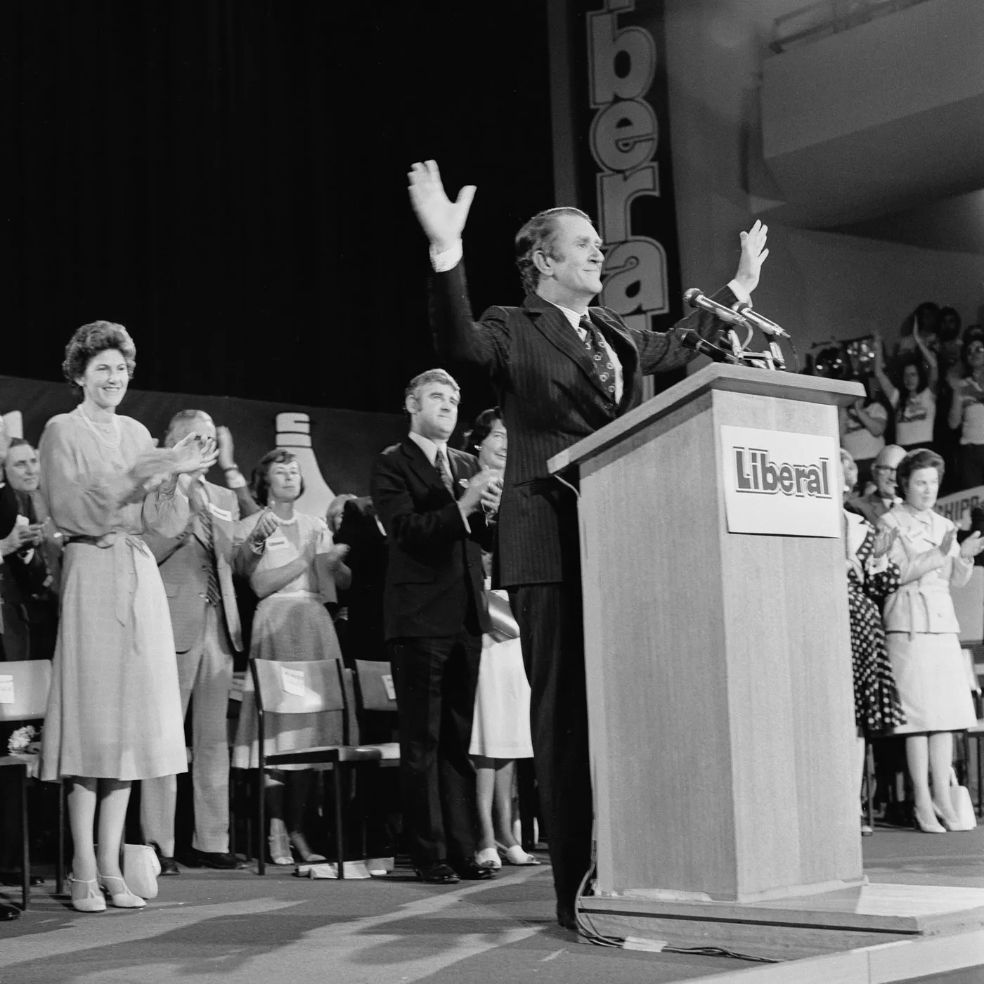 Malcolm Fraser at the launch of the Liberal Party's election campaign at Dallas Brooks Hall, 1975.
Photograph NAA: A6180, 1/12/75/13 Malcolm Fraser stands at a podium on stage at a Liberal campaign rally.