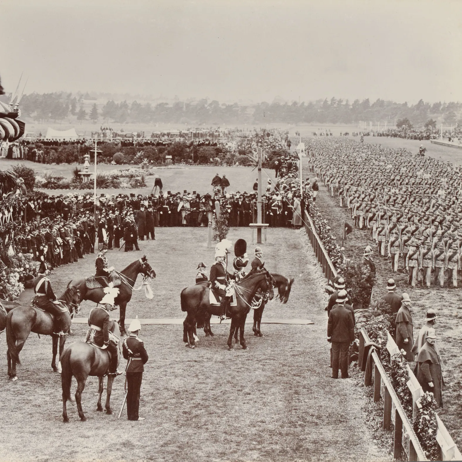 Cadets march on foot past the Duke of York and other dignitaries on horseback at Flemington Racecourse 1901.