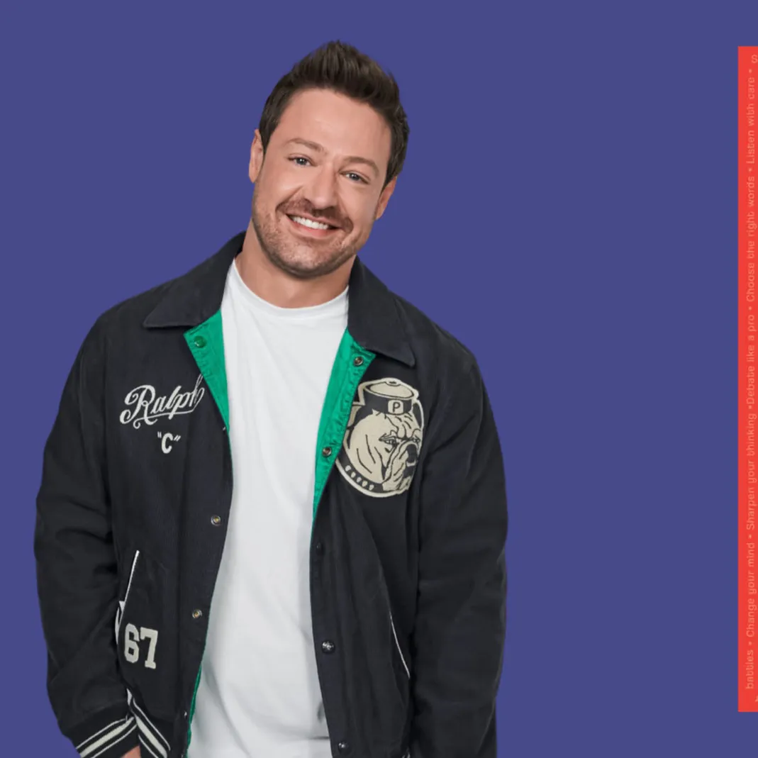 Dr Matt Agnew is pictured next to the front cover of his book, 'The kids' guide to speaking your mind without losing your cool'.