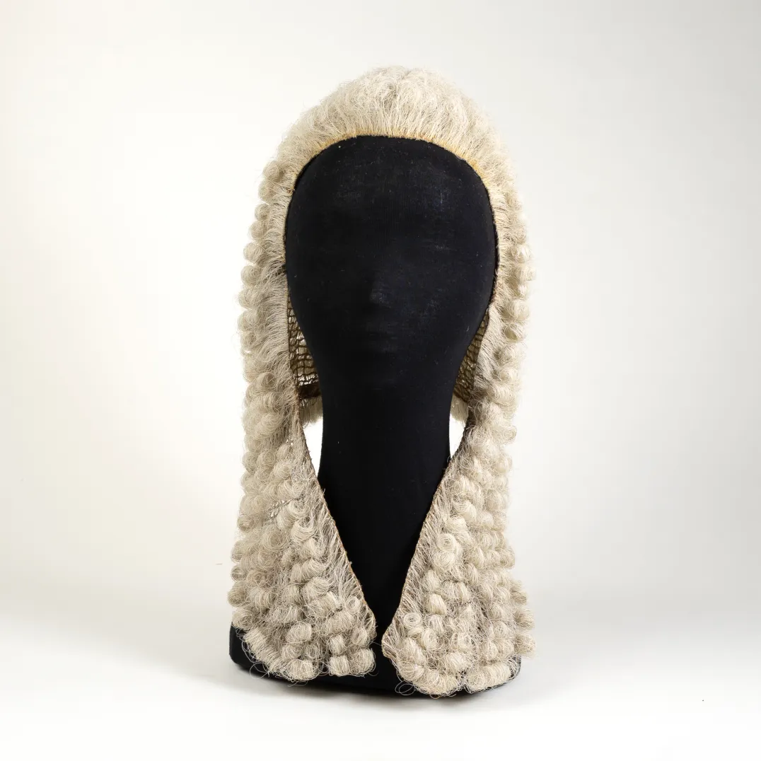 An image of the wig worn by the Speaker of the House of Representatives on a mannequin head