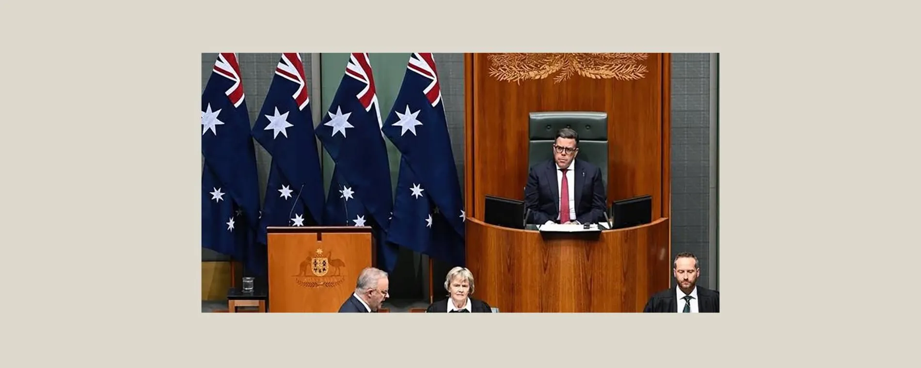 A banner with Milton Dick in the Speakers Chair while in session.
