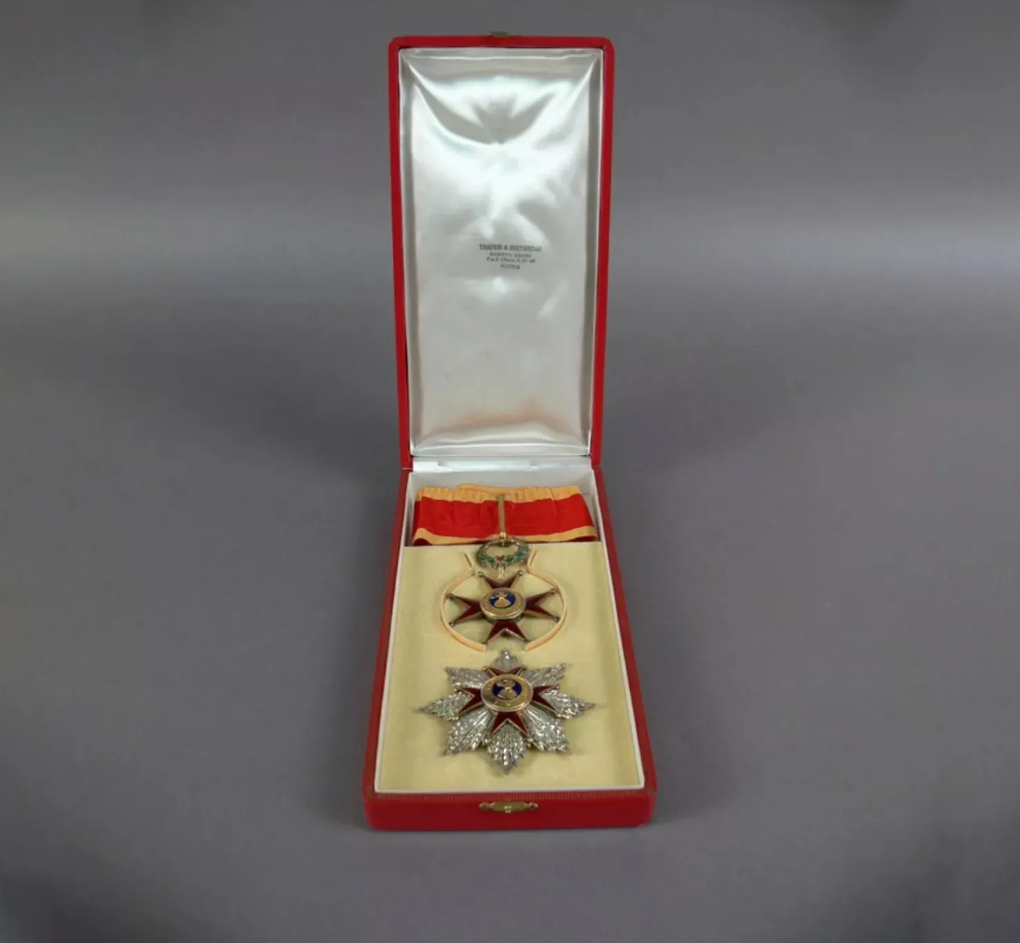 Regalia of a papal knight, two medals of a red cross kept in a silk-lined red box. Regalia of a papal knight, two medals of a red cross kept in a silk-lined red box.