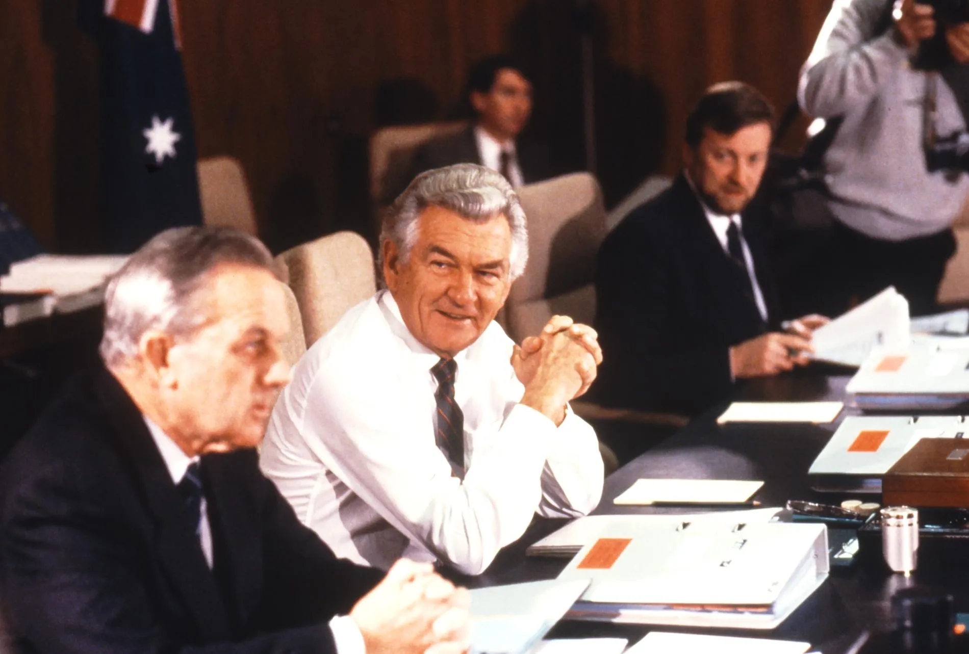 Australian Prime Minister Bob Hawke sits in the Cabinet Room in Old Parliament House with his cabinet.