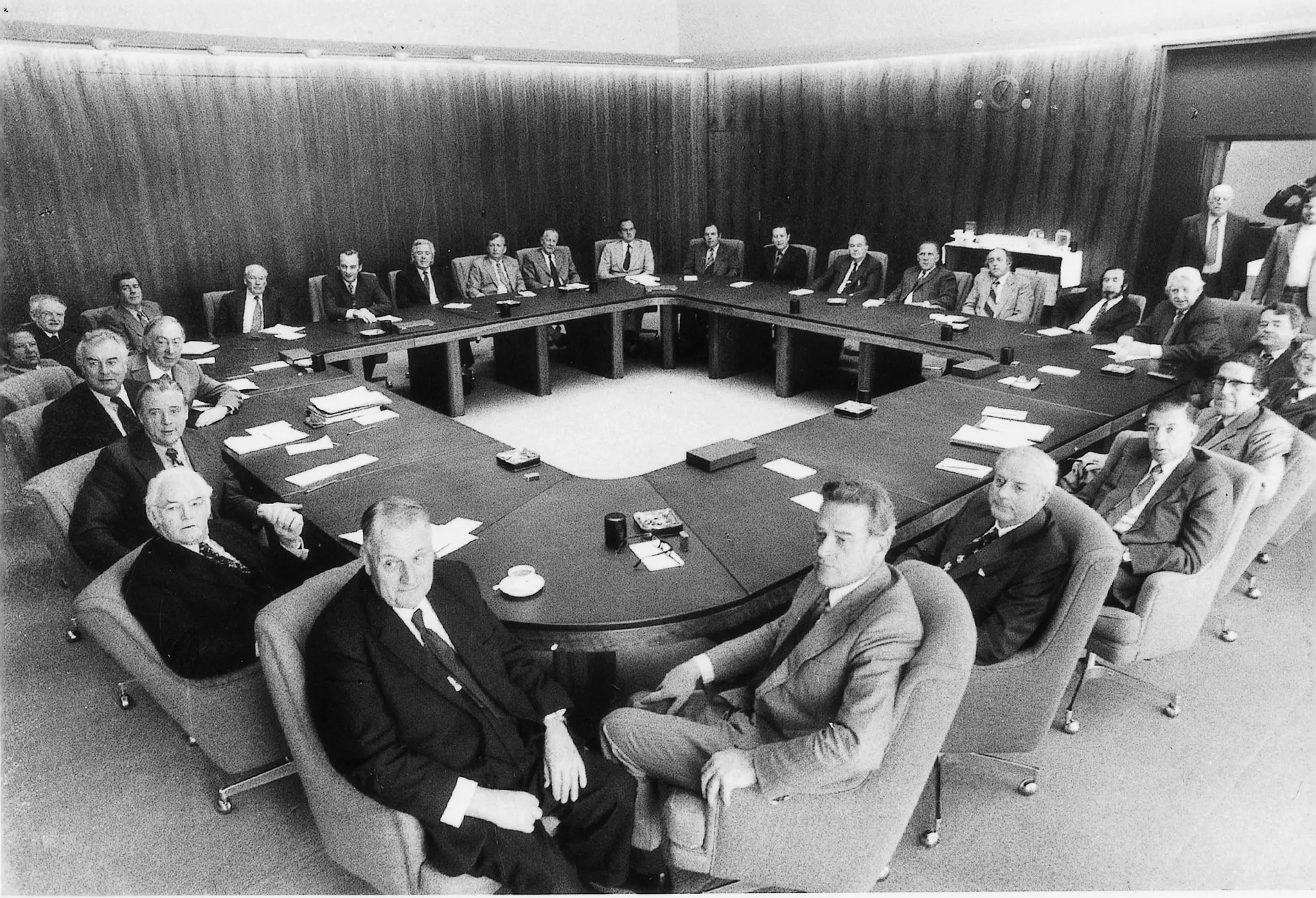 Gough Whitlam and his Cabinet sit at the Cabinet Table in the Cabinet Room at Old Parliament House.